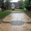 Concrete Stamped Brown Driveway with Design